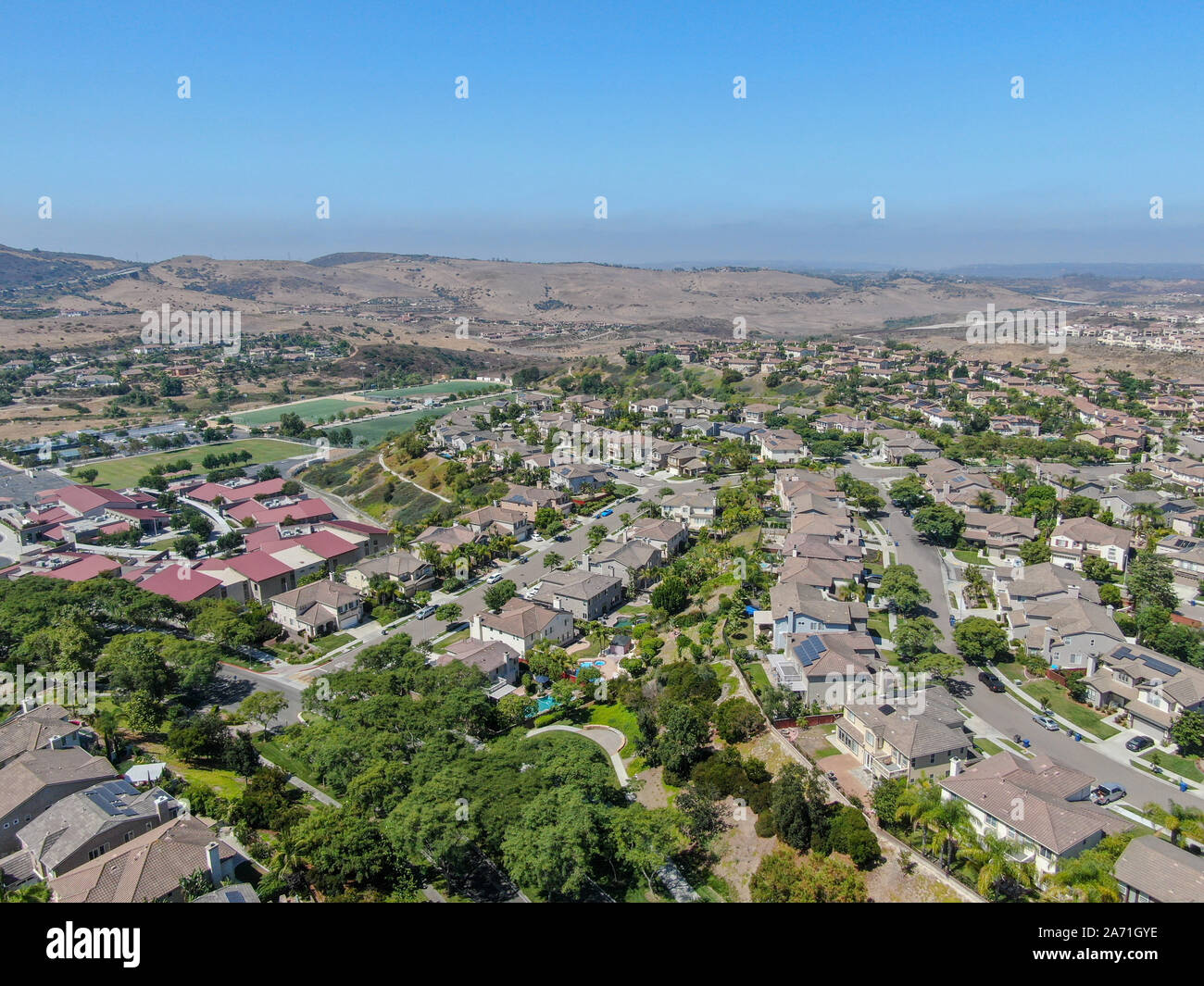 Aerial view suburban neighborhood with big villas next to each other in