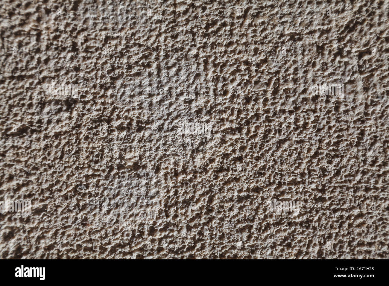Rough stone texture with small details in harsh light Stock Photo - Alamy