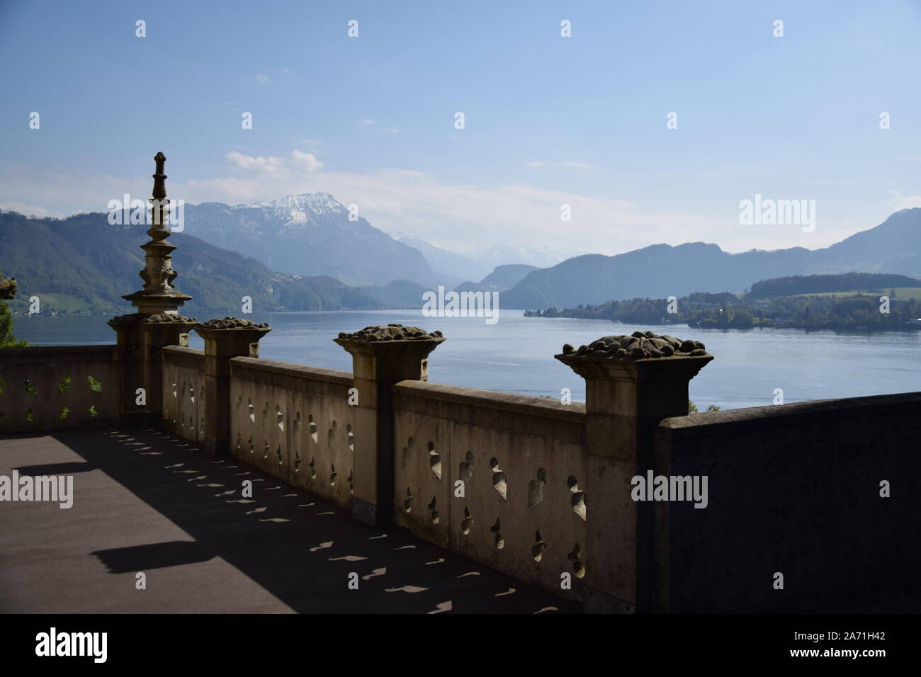 Rail at Schloss Meggenhorn with a view on the Lake of Lucerne and the alps in the back with the queen of the mountains Rigi dominating Stock Photo