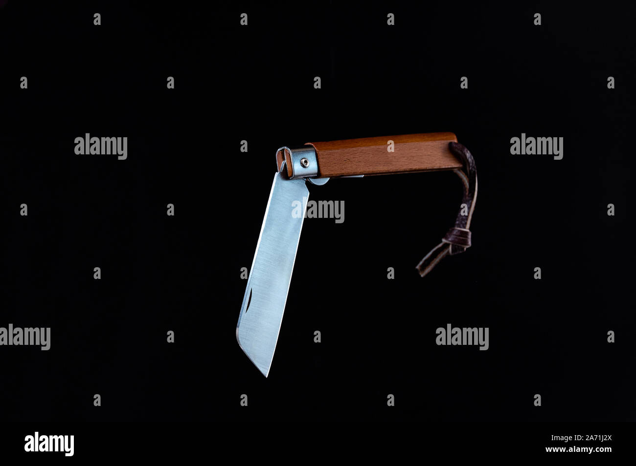 The knife is in a bent position. Knife with a blunt edge of the blade