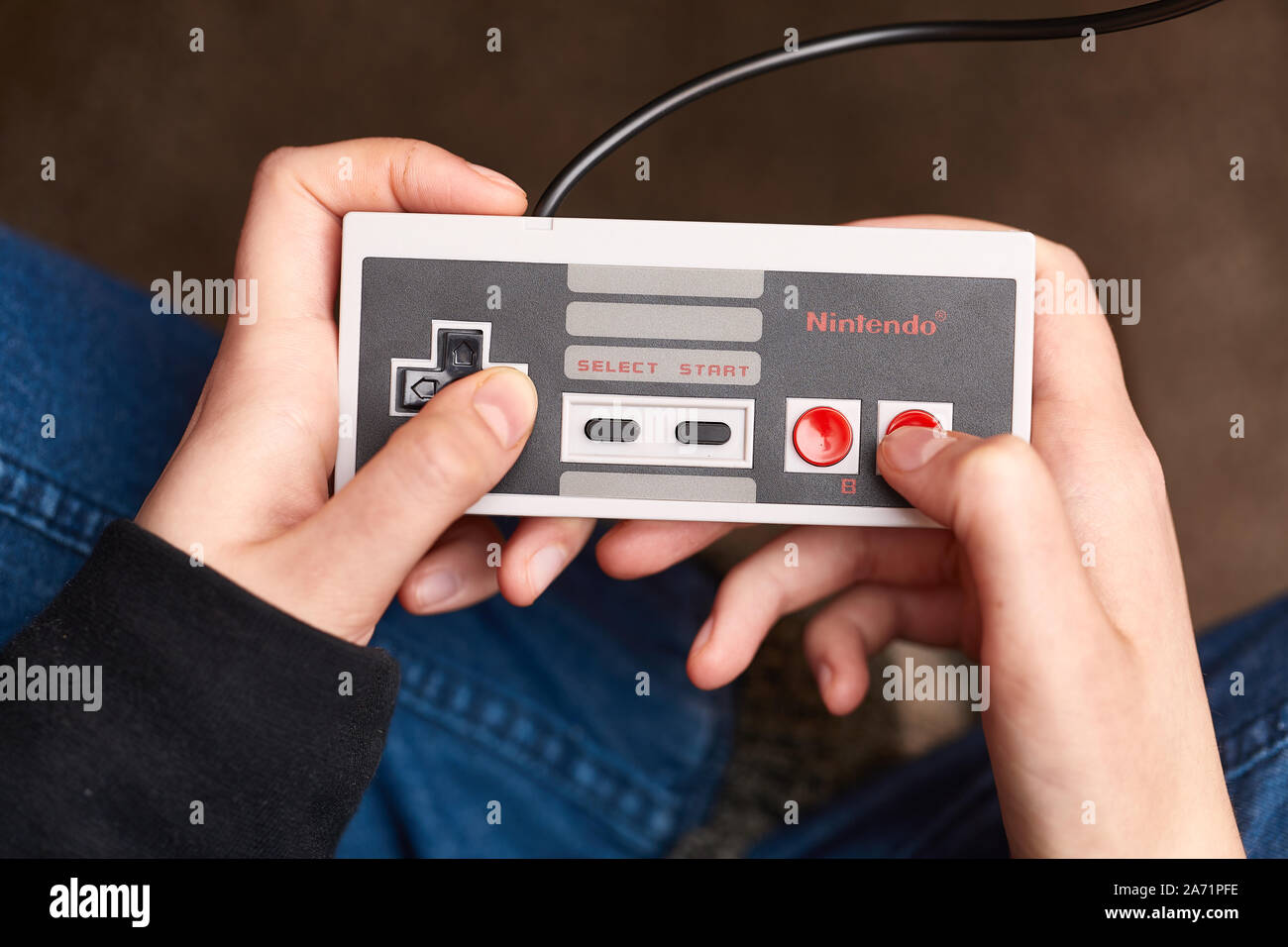 Nintengo NES,playing Super Mario 3 Stock Photo