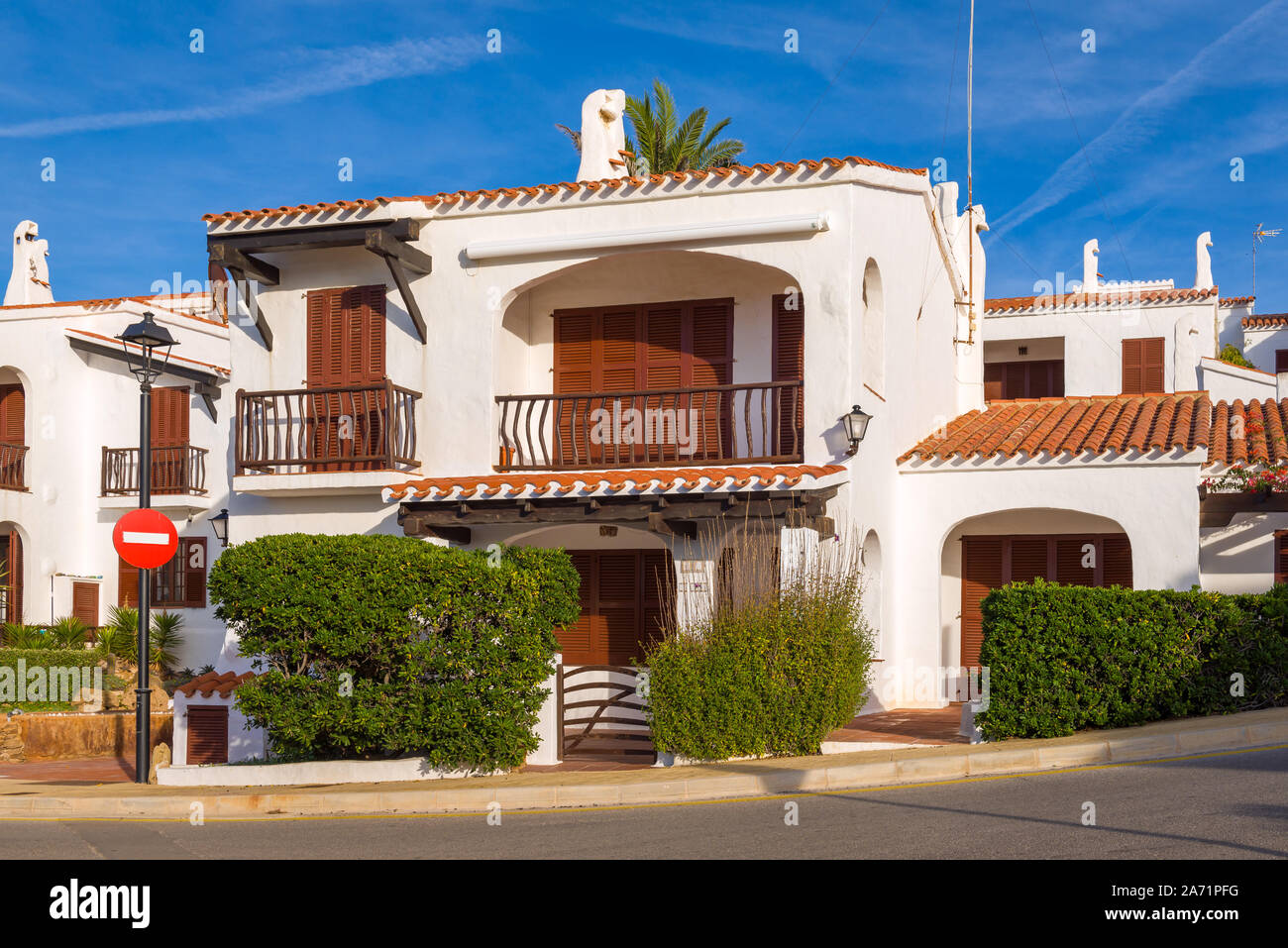 Traditional Spanish architecture with white summer villas on the island of Menorca. Spain Stock Photo