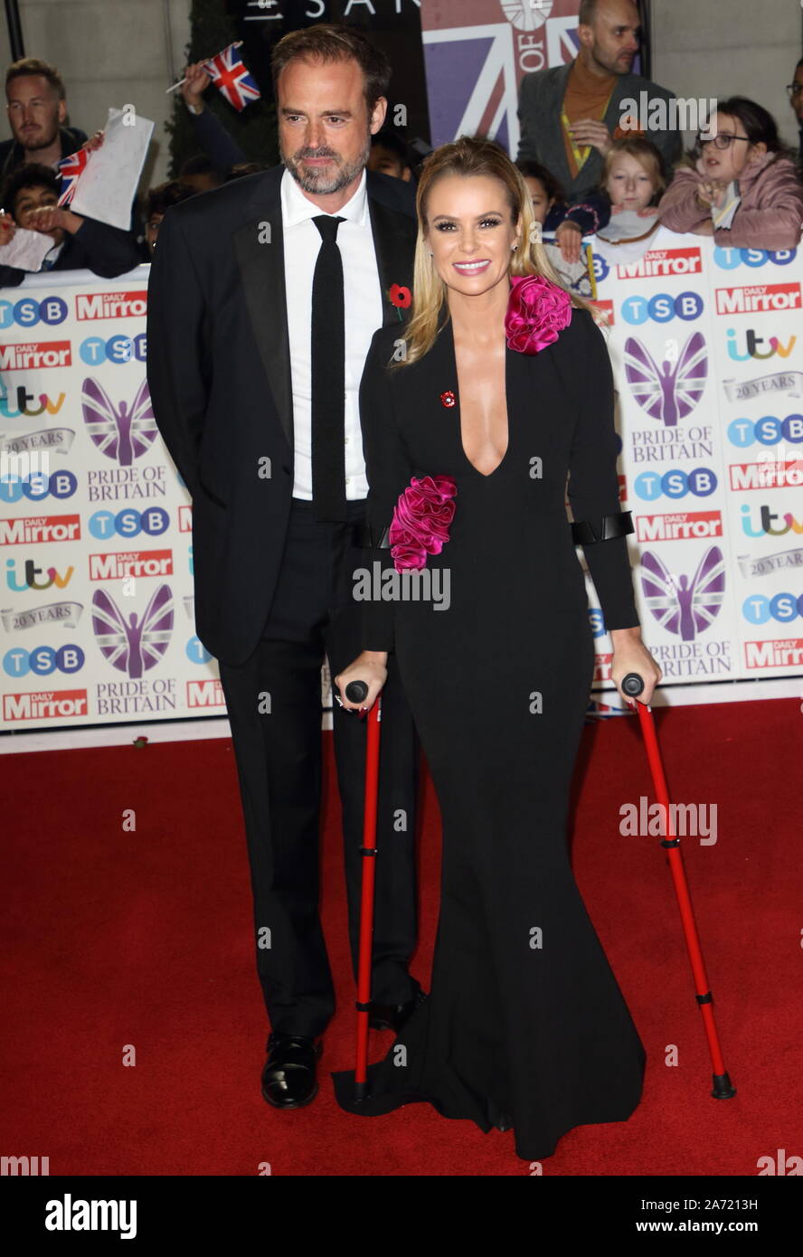 Jamie Theakston and Amanda Holden on the red carpet at The Daily Mirror Pride of Britain Awards, in partnership with TSB, at the Grosvenor House Hotel, Park Lane. Stock Photo
