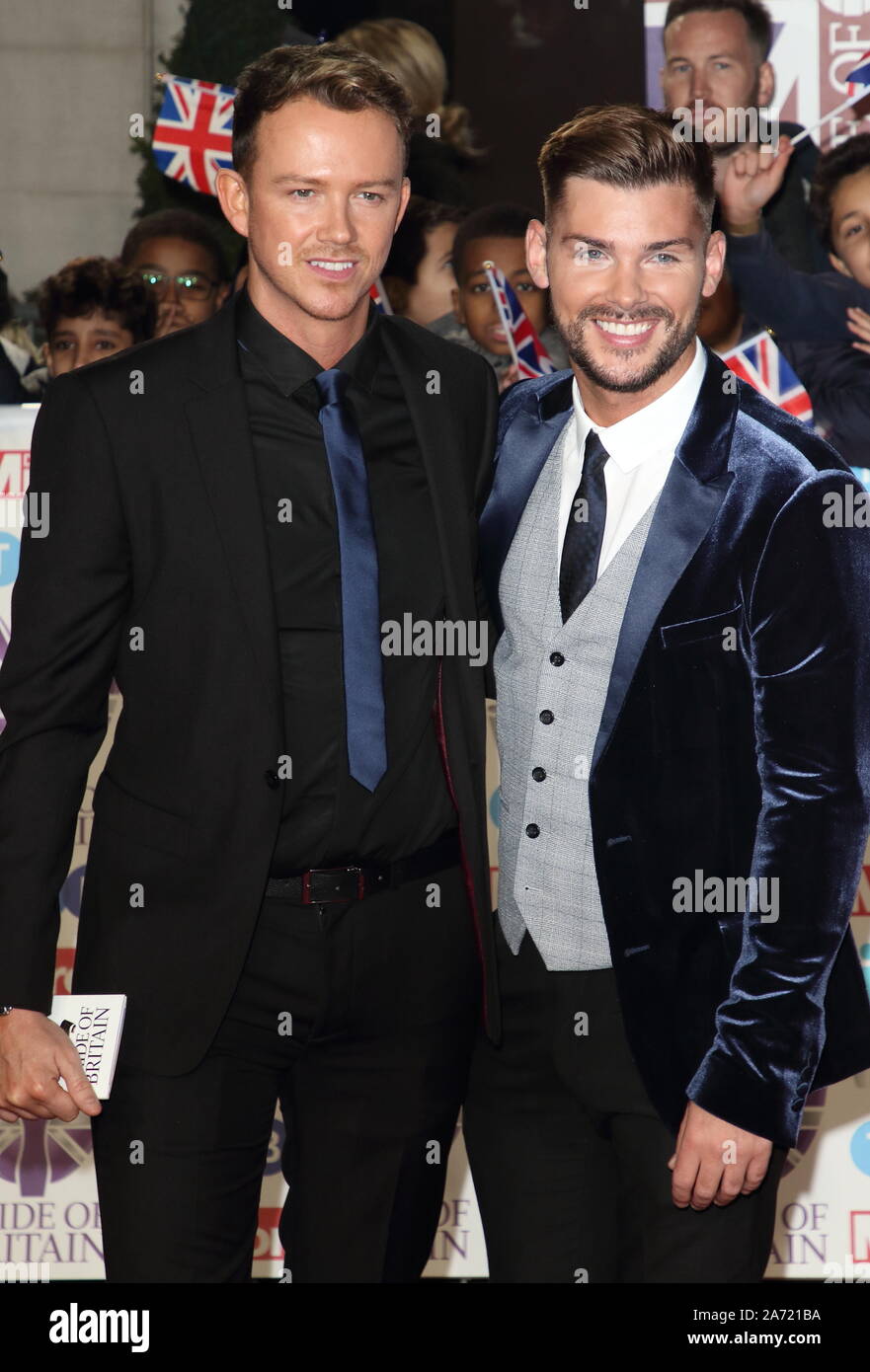 Kieron Richardson and a guest on the red carpet at The Daily Mirror Pride of Britain Awards, in partnership with TSB, at the Grosvenor House Hotel, Park Lane. Stock Photo