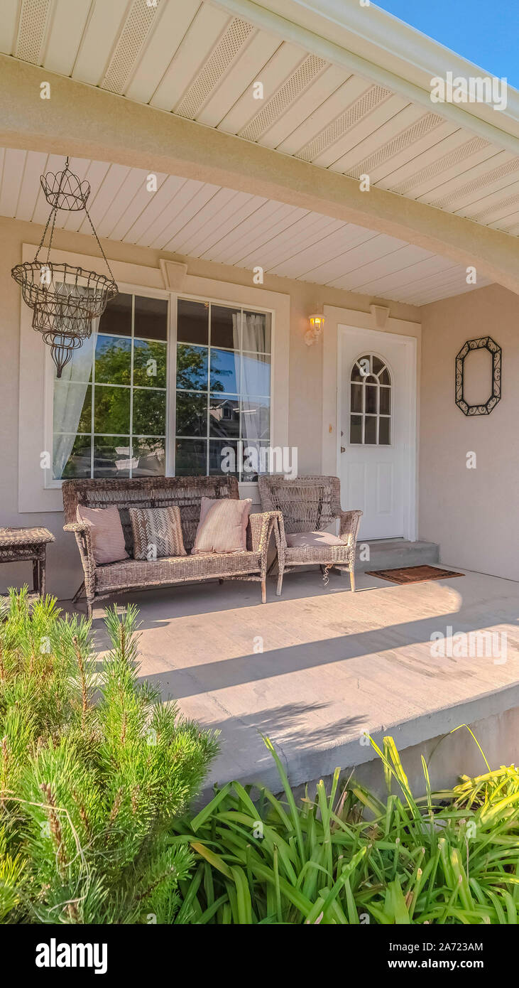Vertical frame Front porch and garden of a traditional home Stock Photo ...