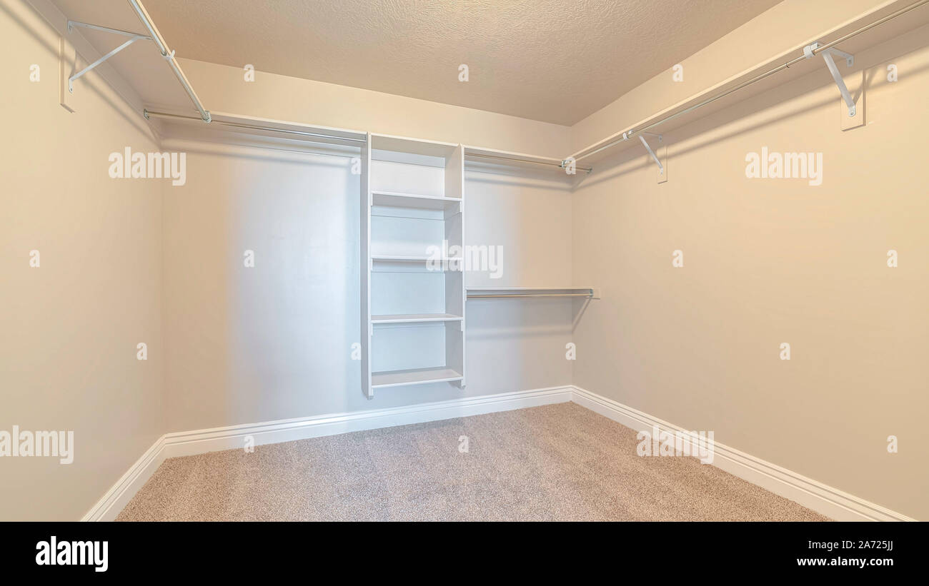 Panorama frame Empty white walk in closet with bare shelving Stock ...
