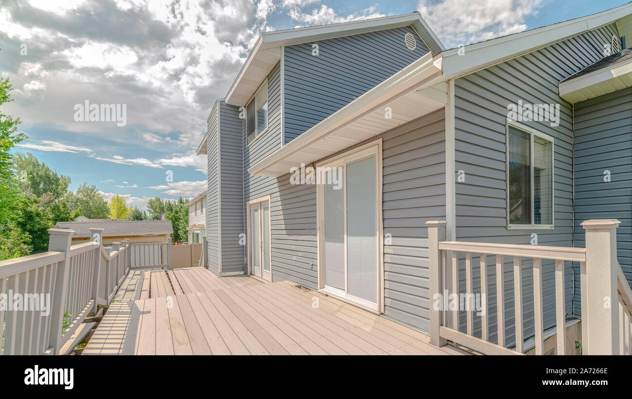 Panorama Modern two storey home with unfinished deck area Stock Photo