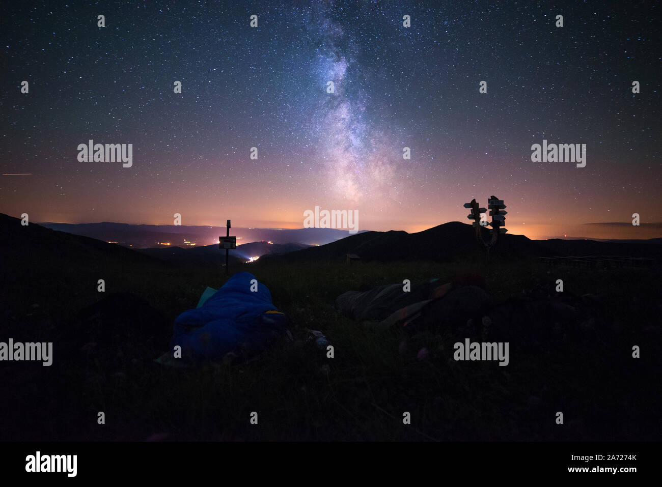 Sleeping Under The Stars, Men In A Sleeping Bag And Shining Milky Way ...