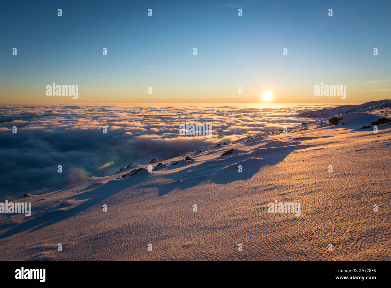Snow inversion mountain sunset hi-res stock photography and images - Alamy