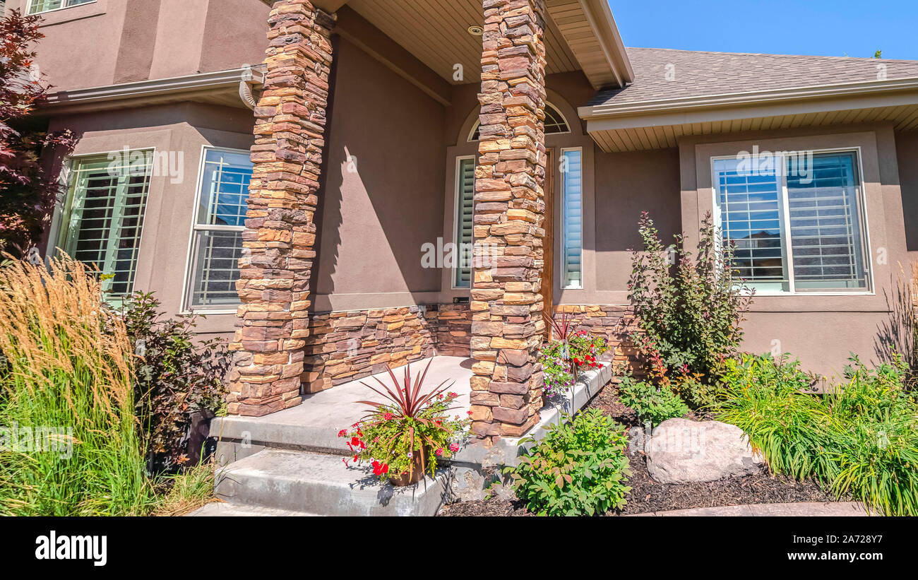 Panorama frame Modern house and front yard with stone pillars Stock ...