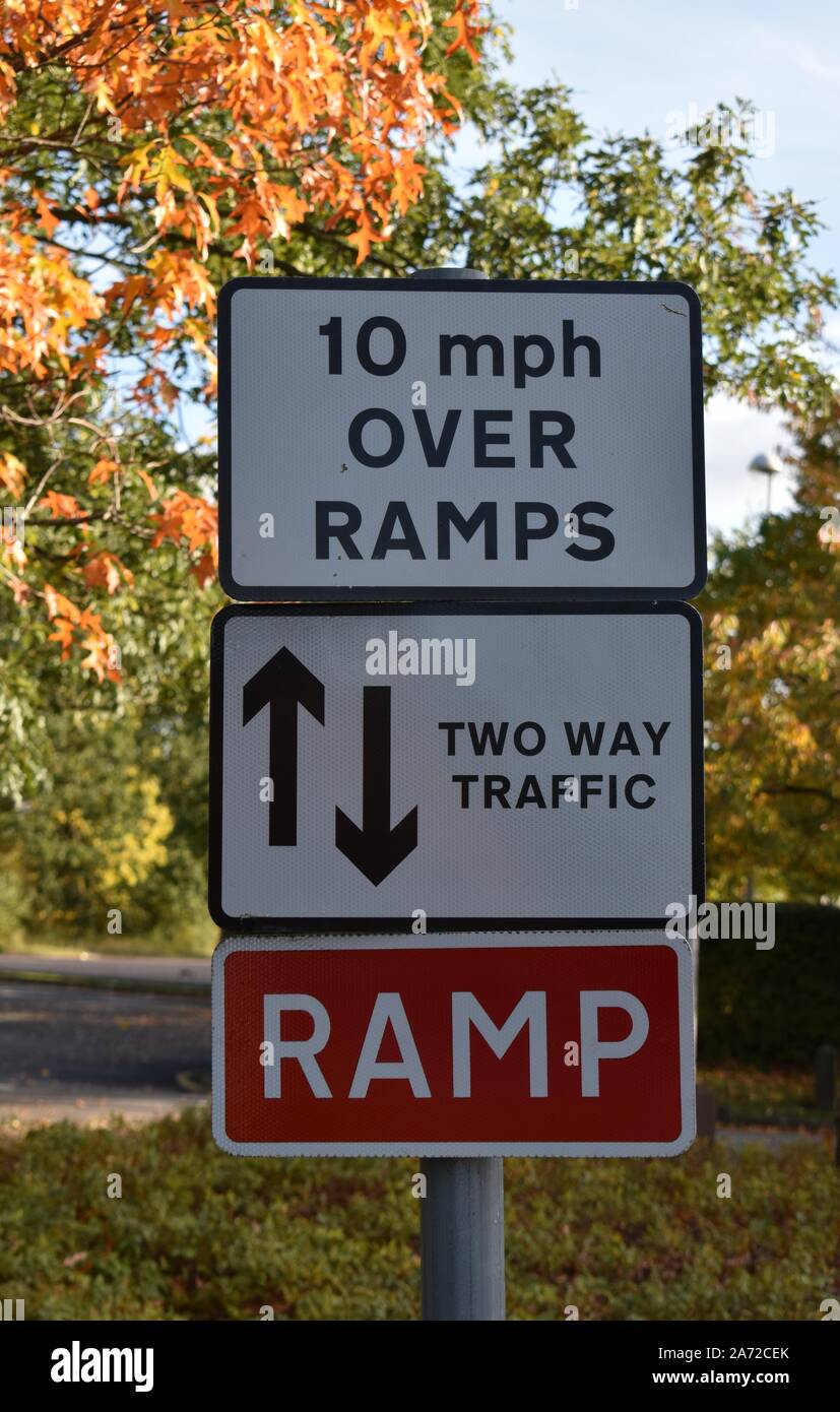 Road sign: 10 mph over ramps, two way traffic, RAMP. Stock Photo