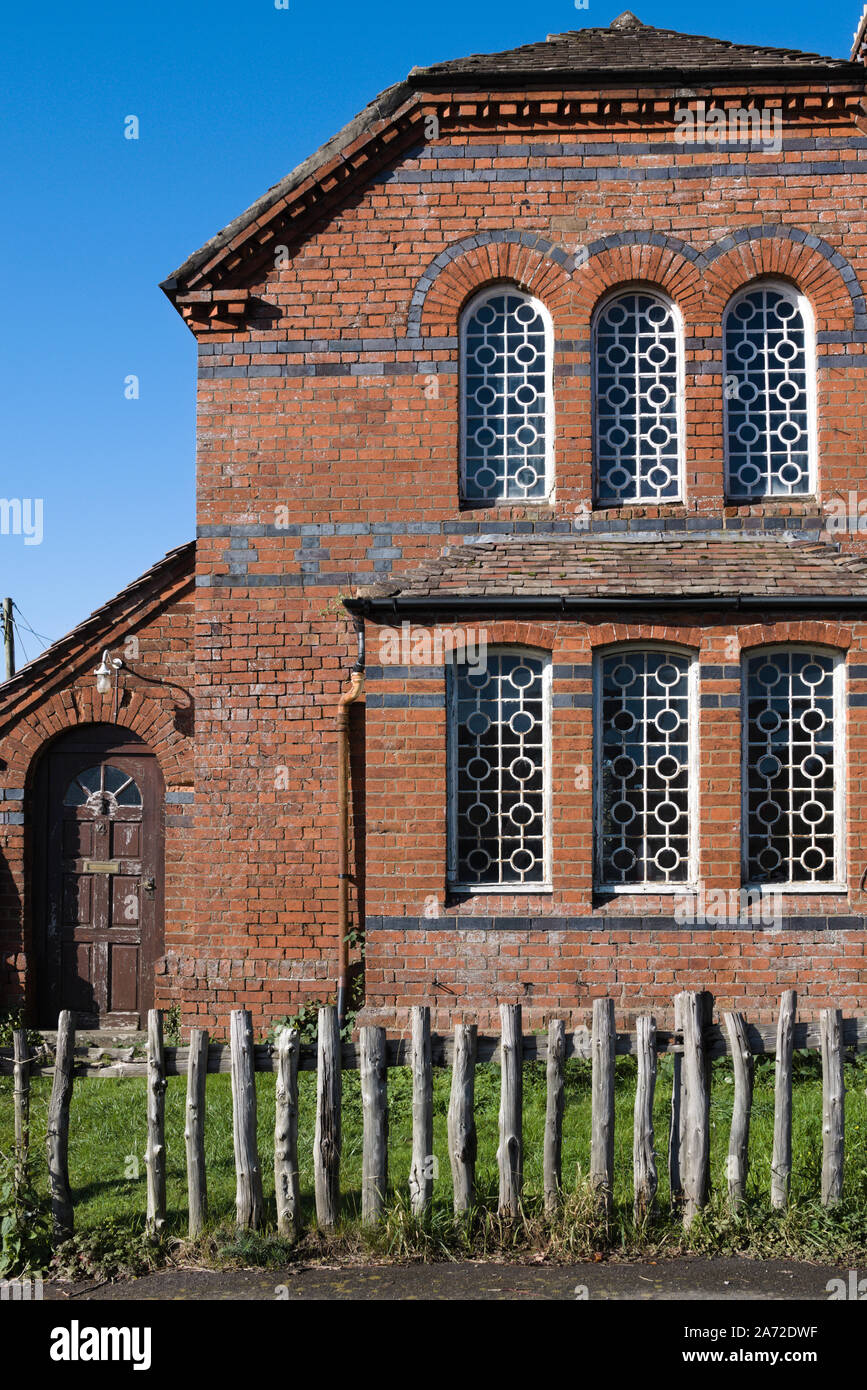 Redbrick terraced house in rural Herefordshire. Stock Photo