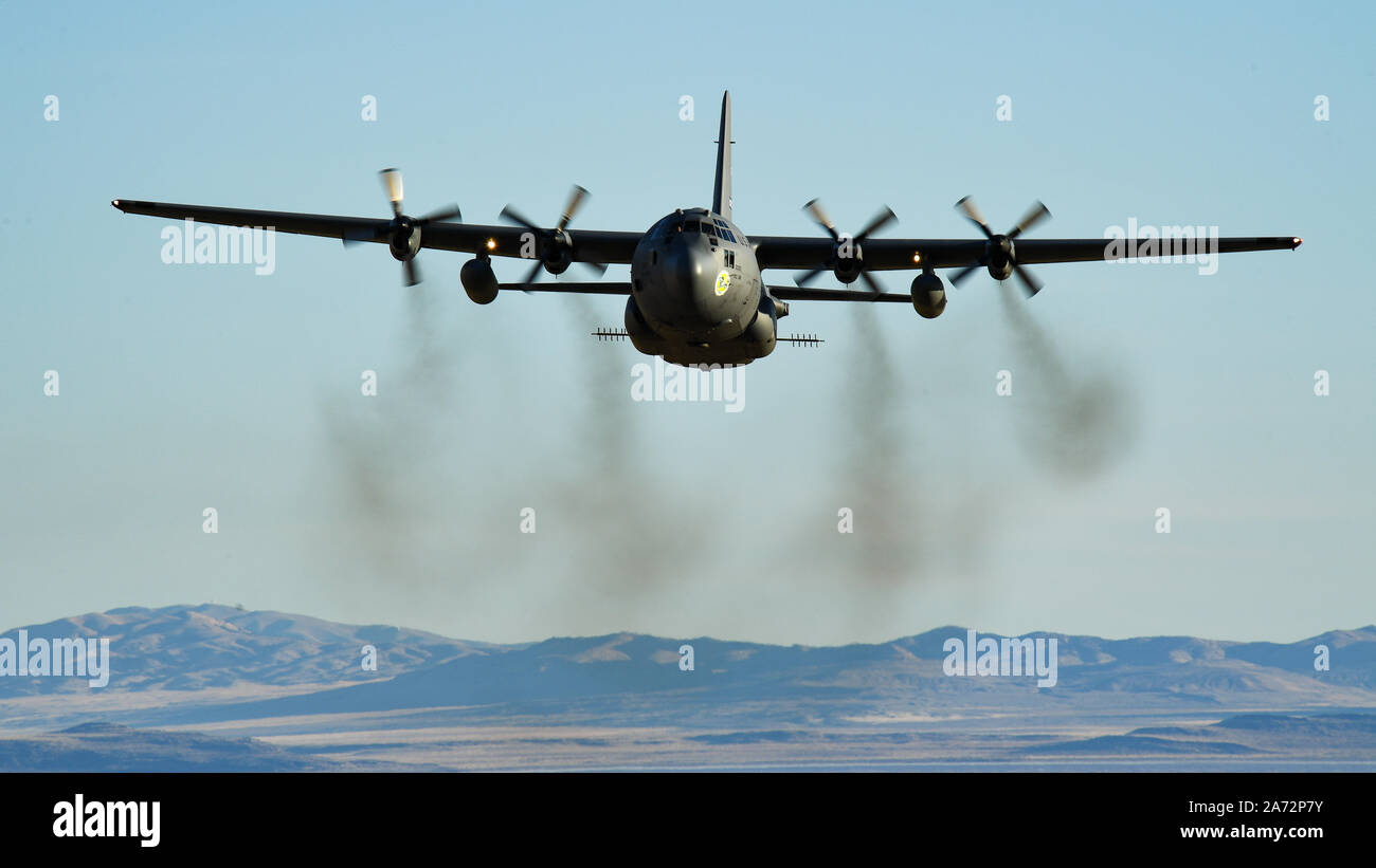 A C-130 Hercules assigned to the Air Force Reserve 757th Airlift Squadron flies over the Utah Test and Training Range Oct. 24, 2019, during an aerial spray operation. The aircraft sprayed invasive vegetation to establish new and expand existing firebreaks on the range in areas inaccessible to work crews due to unexploded ordnance hazards. (U.S. Air Force photo by R. Nial Bradshaw) Stock Photo