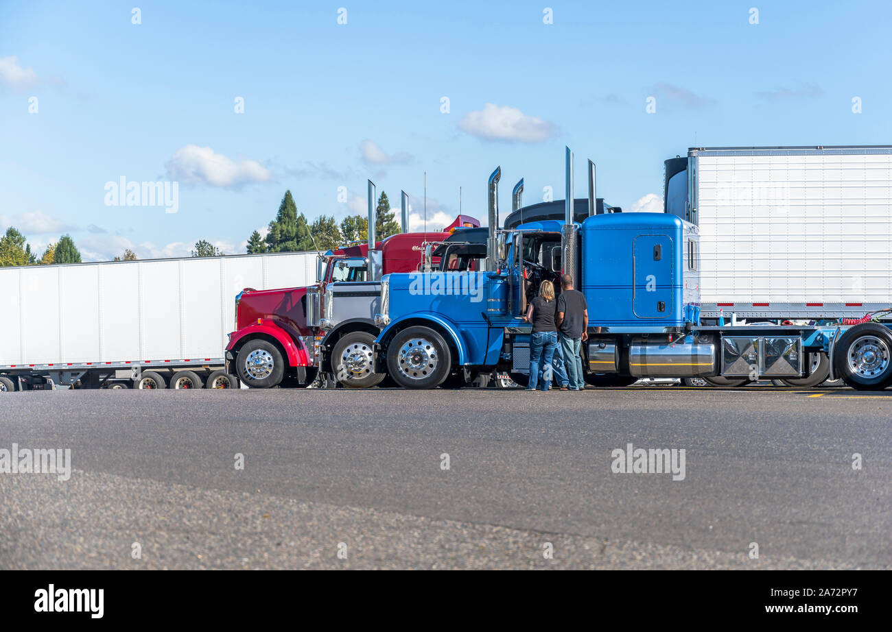 Two Truck drivers exchange views on the strengths and weaknesses of