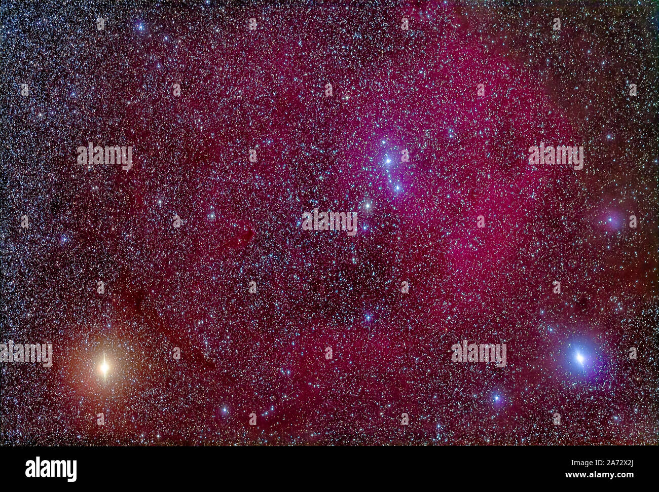 The area of the head of Orion with the large Lambda Orionis nebulosity surrounding the star Meissa at top, with Betelgeuse (left) and Bellatrix (right Stock Photo
