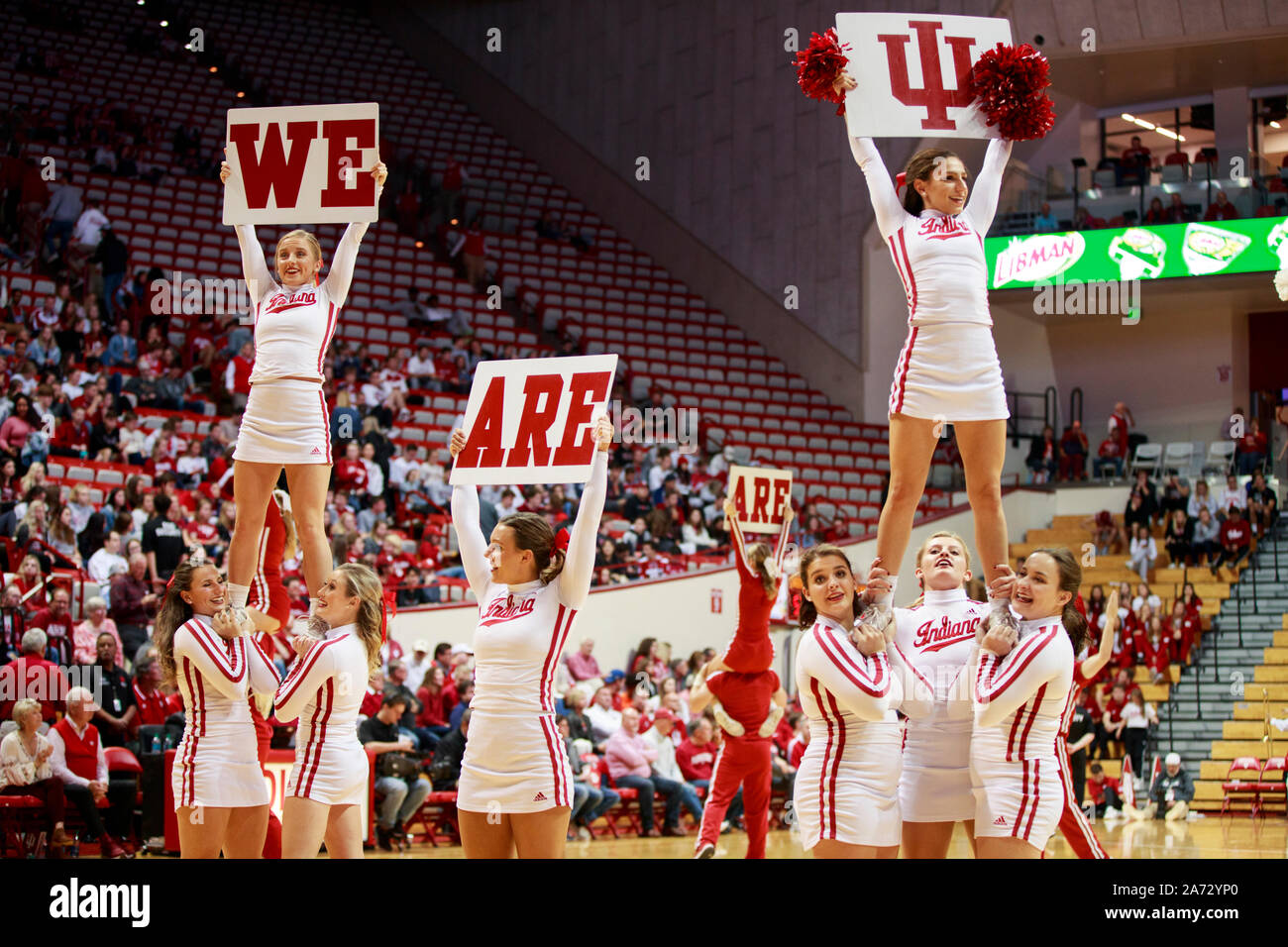 Indiana University's cheerleaders cheer against Gannon during an NCAA exhibition basketball game, Tuesday, Oct., 29, 2019 at Simon Skjodt Assembly Hall in Bloomington, Ind. Indiana beat Gannon 84 to 54. (Photo by Jeremy Hogan/The Bloomingtonian) Stock Photo