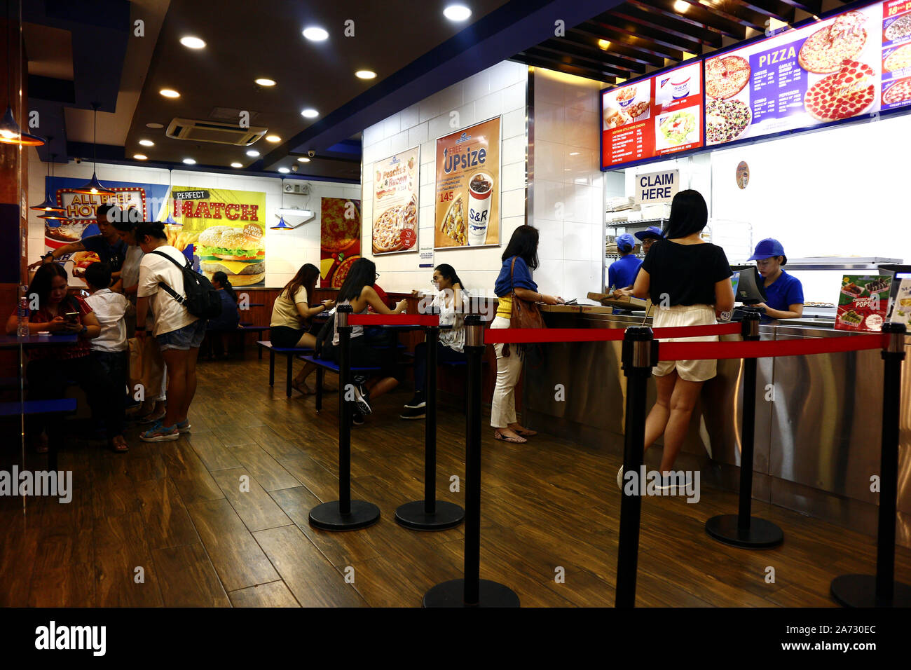 Pizza parlor hires stock photography and images Alamy