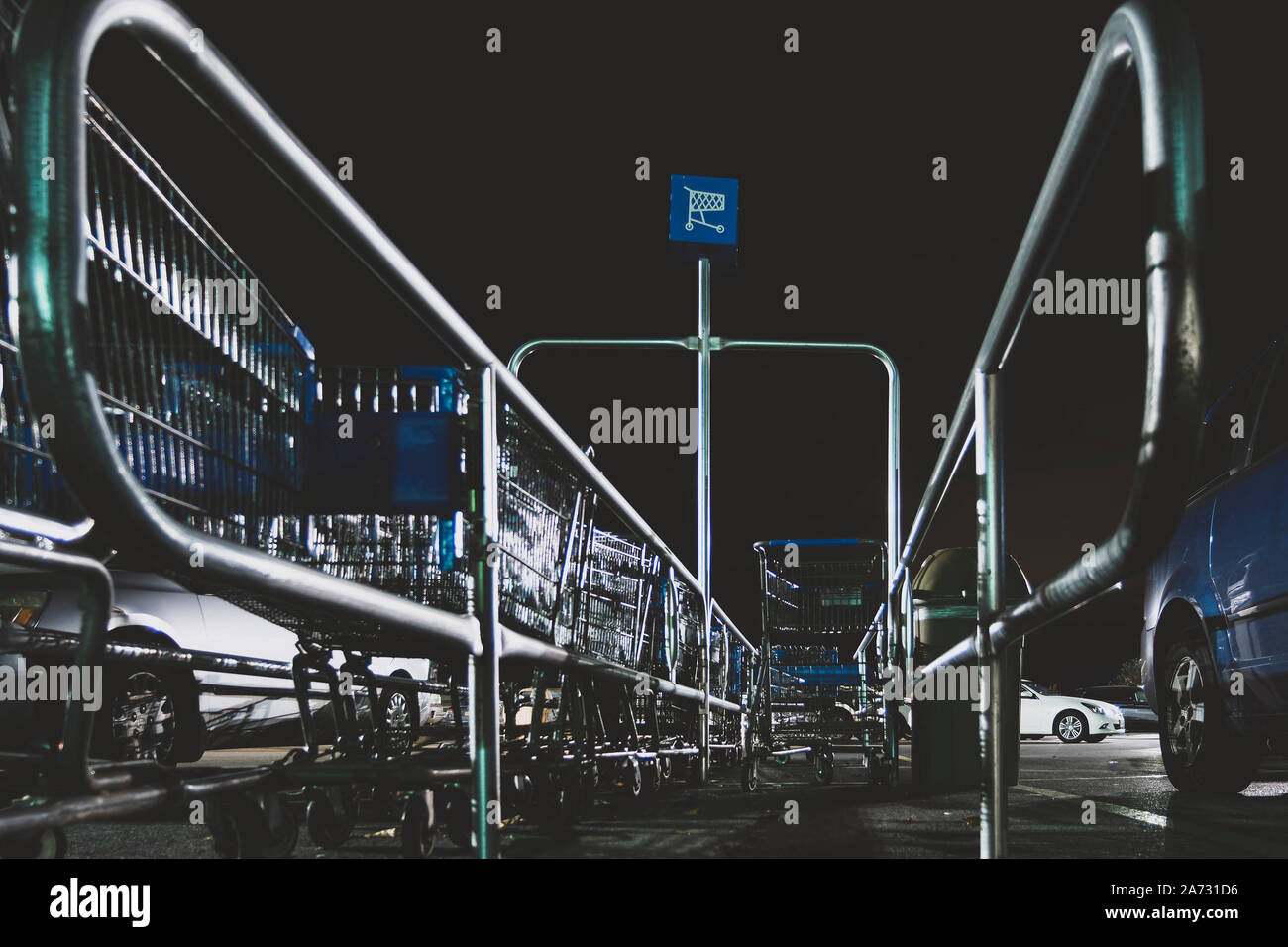 New Hartford, New York - Oct 29, 2019: Abstract View of Walmart Supercenter Shopping Cart Return Area in a Car Park. Stock Photo