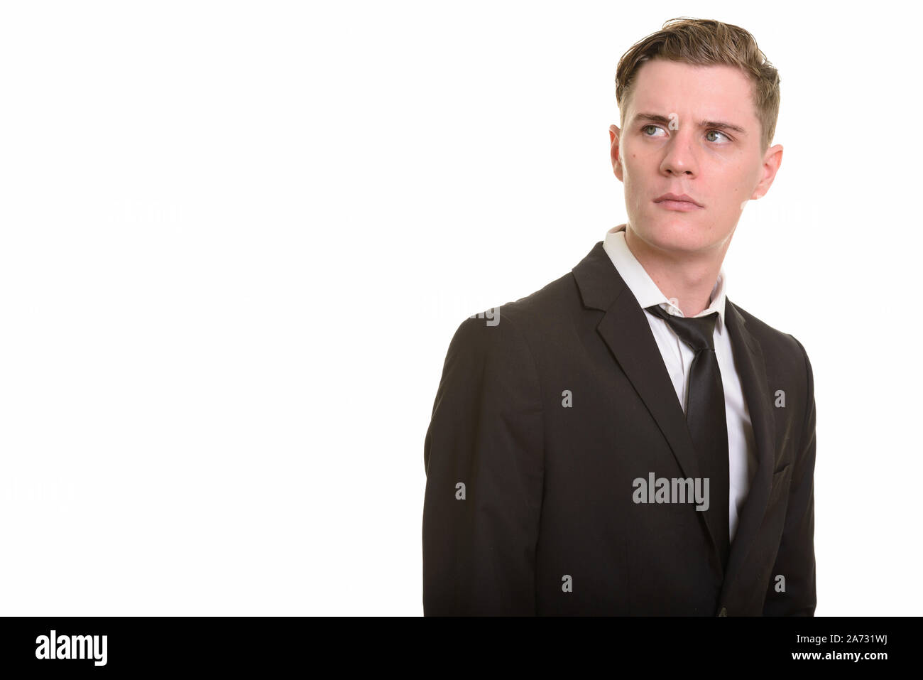 Face of young handsome blonde businessman in suit Stock Photo - Alamy