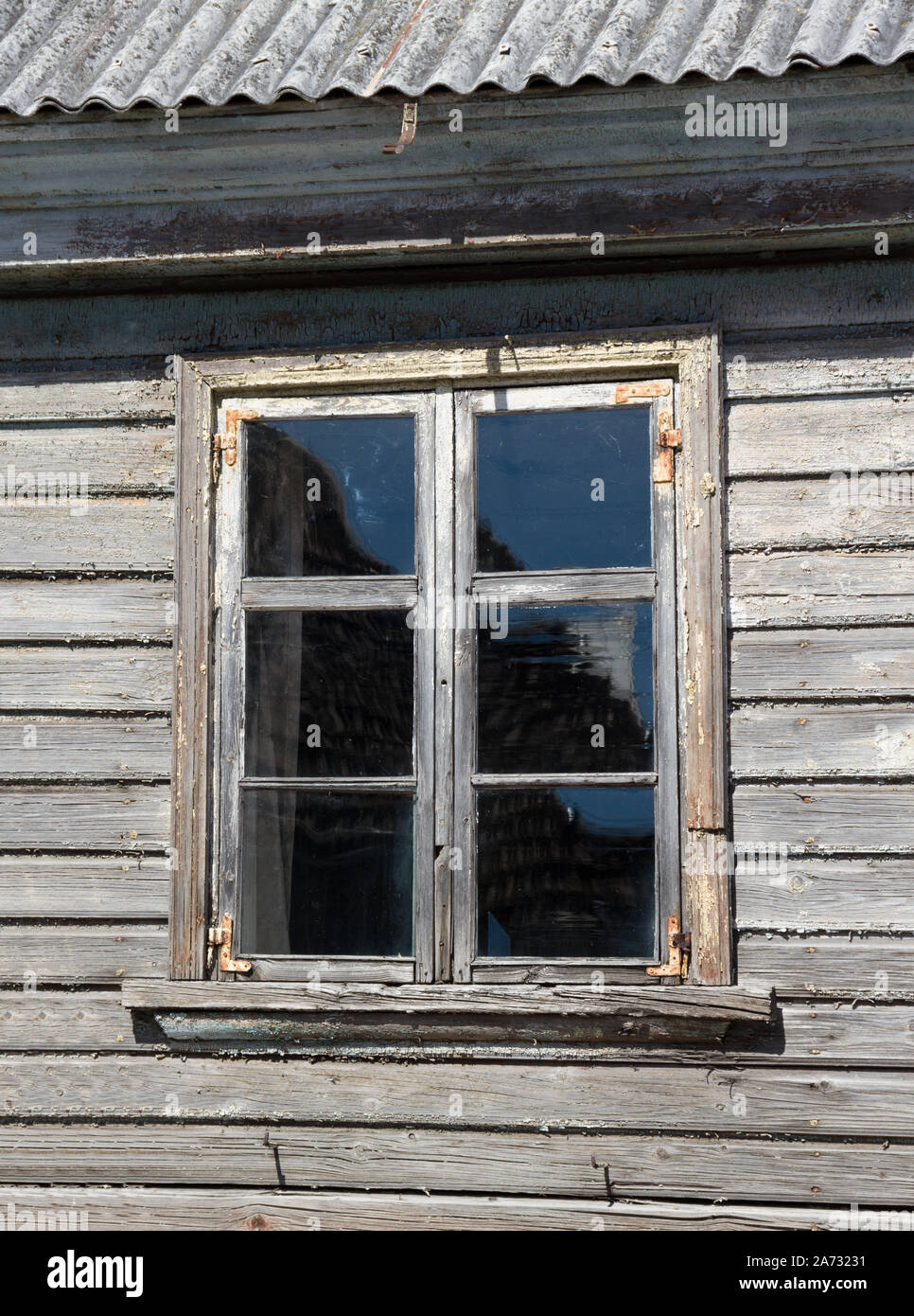 Window in the wall of an old wooden house Stock Photo - Alamy