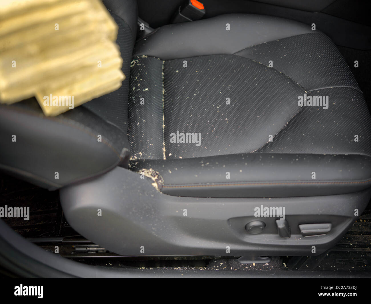 Sawdust on a leather car seat, modern car interior close-up Stock Photo ...