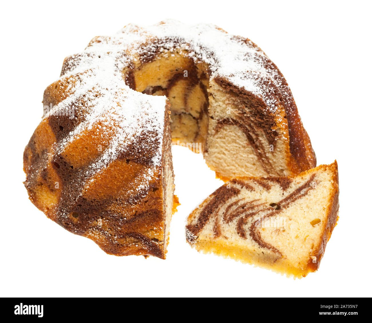 Marble cake with single slice isolated on white background Stock Photo