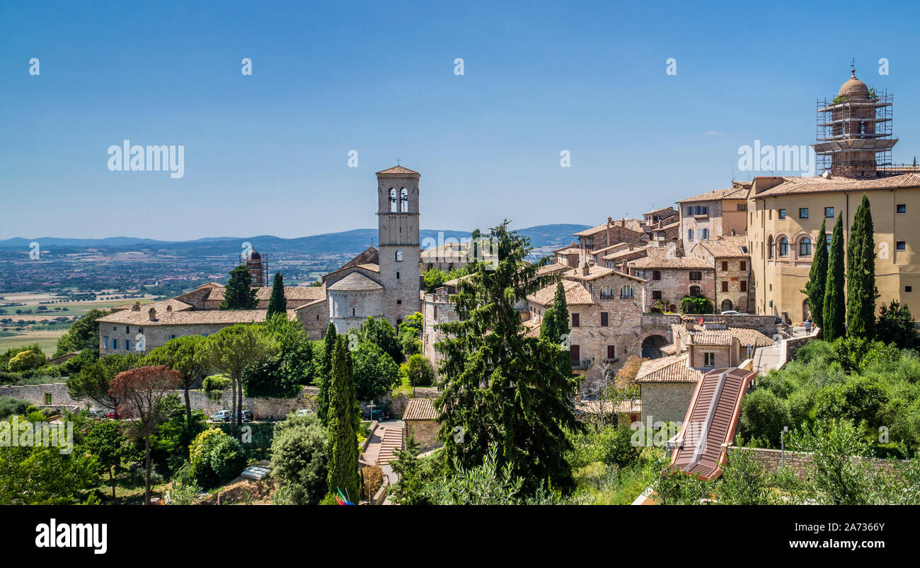 hillside view of Assisi with church of Santa Maria Maggiore, Umbria, Italy Stock Photo