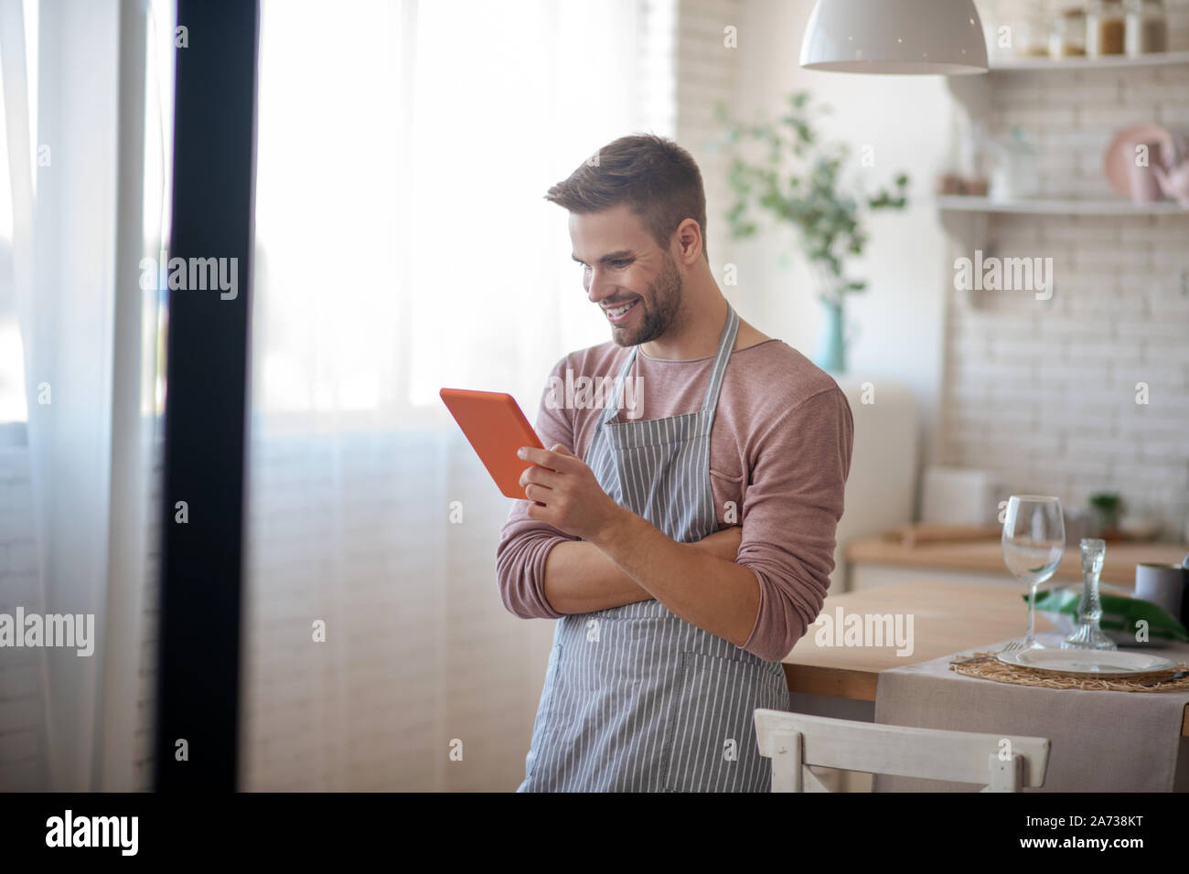 Man feeling excited before cooking romantic dinner Stock Photo