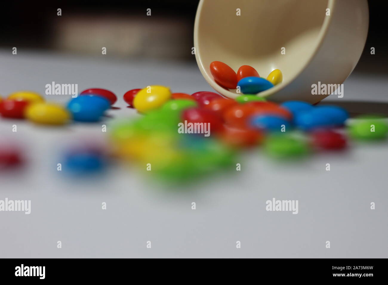 Sugar Coated Chocolate Gems Candy Stock Photo - Alamy