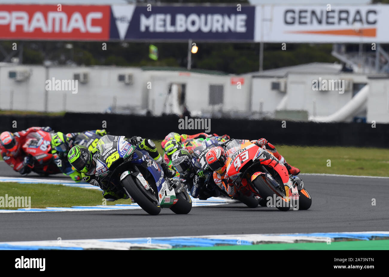 Cal Crutchlow, Marc Marquez and Vinales lead the way through turn 4 in the early stages of the Australian MotoGP Stock Photo