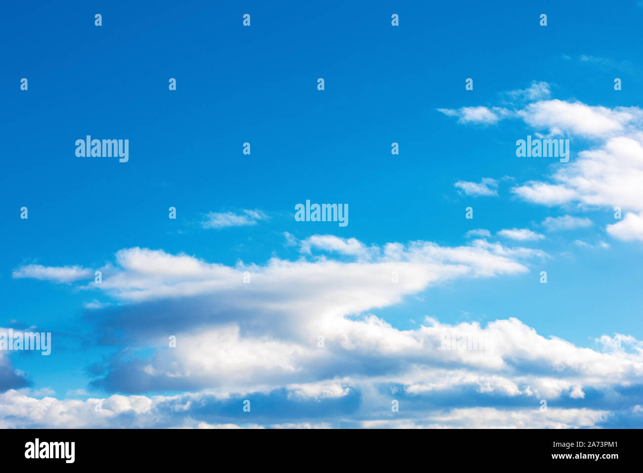 fluffy clouds on the azure winter sky. sunny weather. beautiful nature background for compositing Stock Photo
