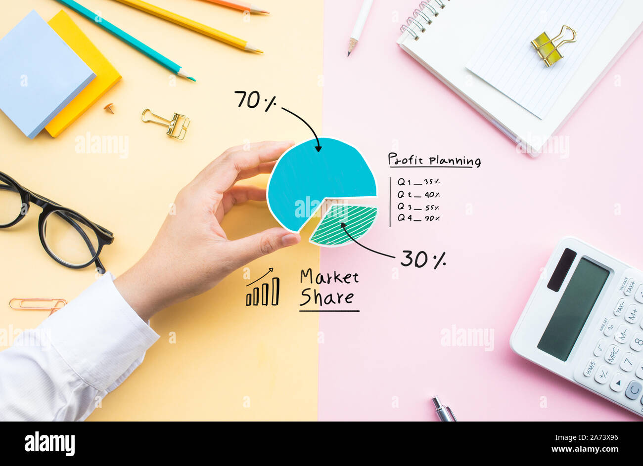 Market share concepts with business person sharing chart diagram on desk table office.investment and financial economy ideas Stock Photo