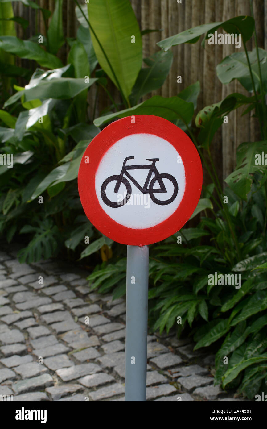 A hand drawn cycle path sign in Trancoso, Brazil Stock Photo