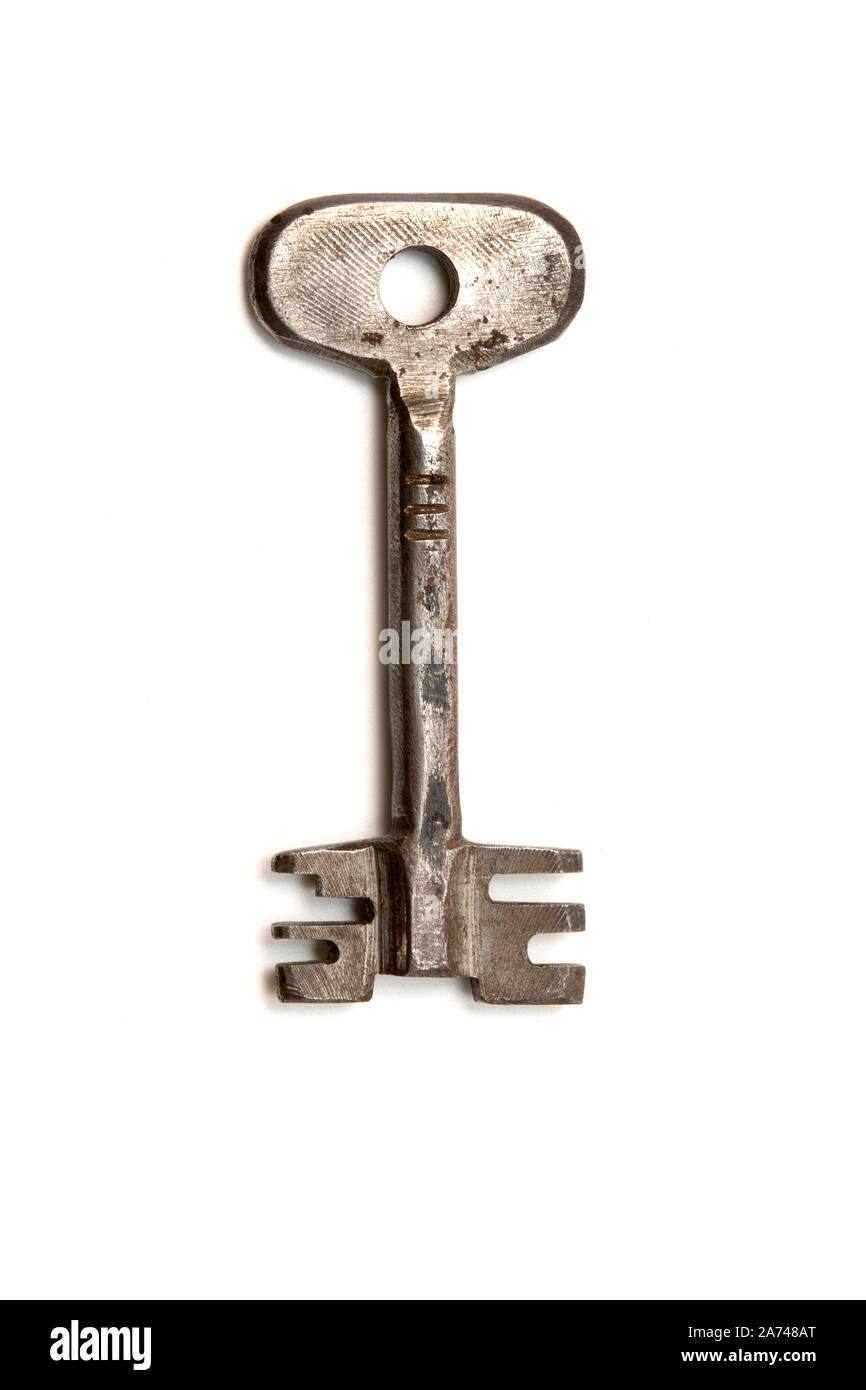 Old key on a white background Stock Photo
