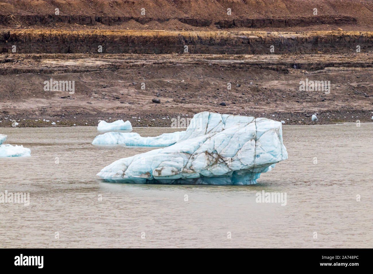 An iceberg floating in Croker Bay, Devon Island, Nunavut, Canada Stock Photo