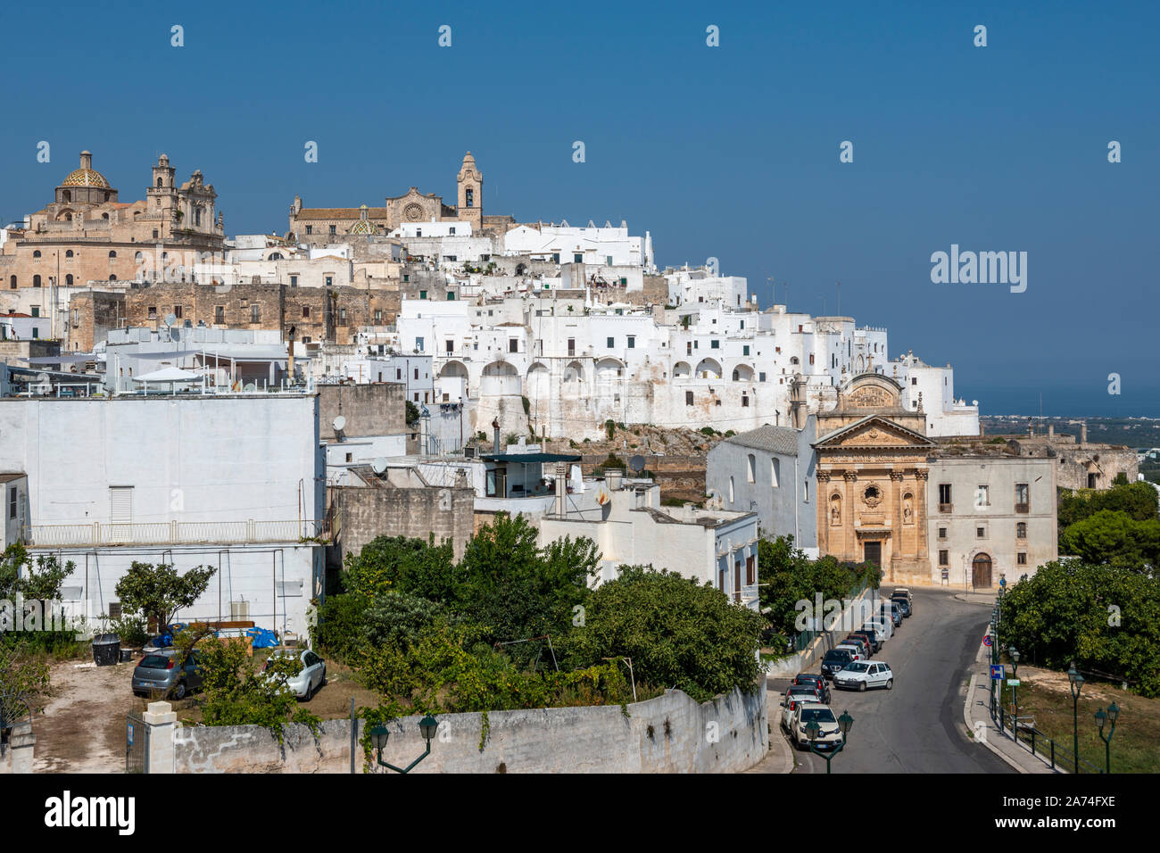 View of whitewashed houses in old town of Ostuni from Corso Vittorio
