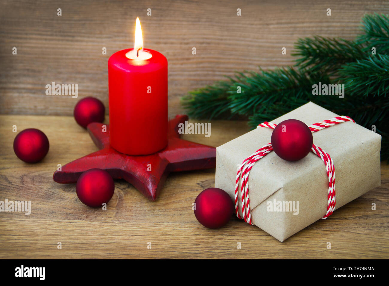 Christmas decoration with gift and candle Stock Photo
