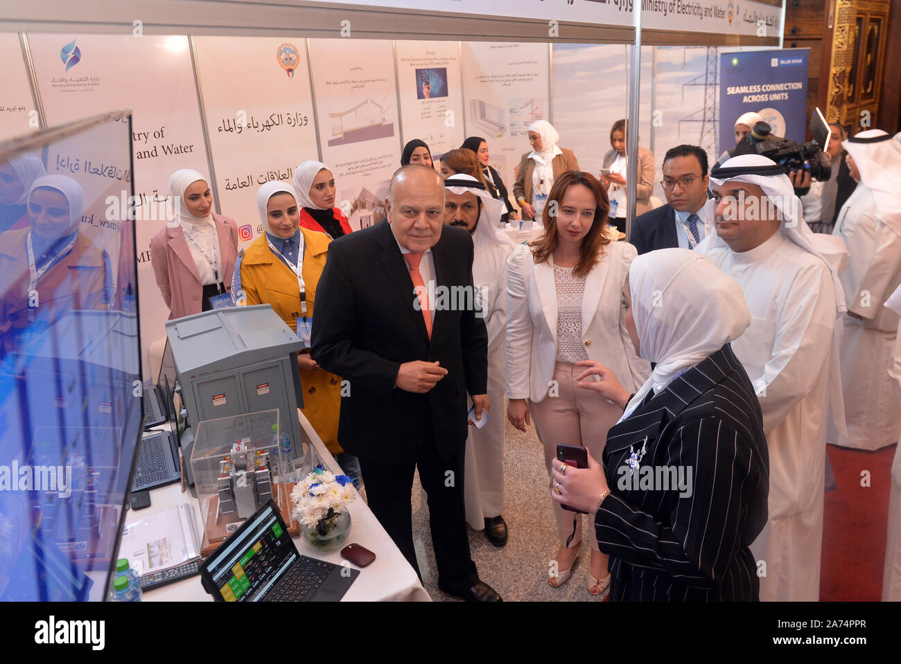Hawalli Governorate, Kuwait. 30th Oct, 2019. People visit a smart grid exhibition in Hawalli Governorate, Kuwait, Oct. 30, 2019. A two-day-long smart grid exhibition kicked off here on Wednesday, which focused on smart grid technology, smart power generation, renewable solutions, energy efficiency and smart metering. Credit: Asad/Xinhua/Alamy Live News Stock Photo