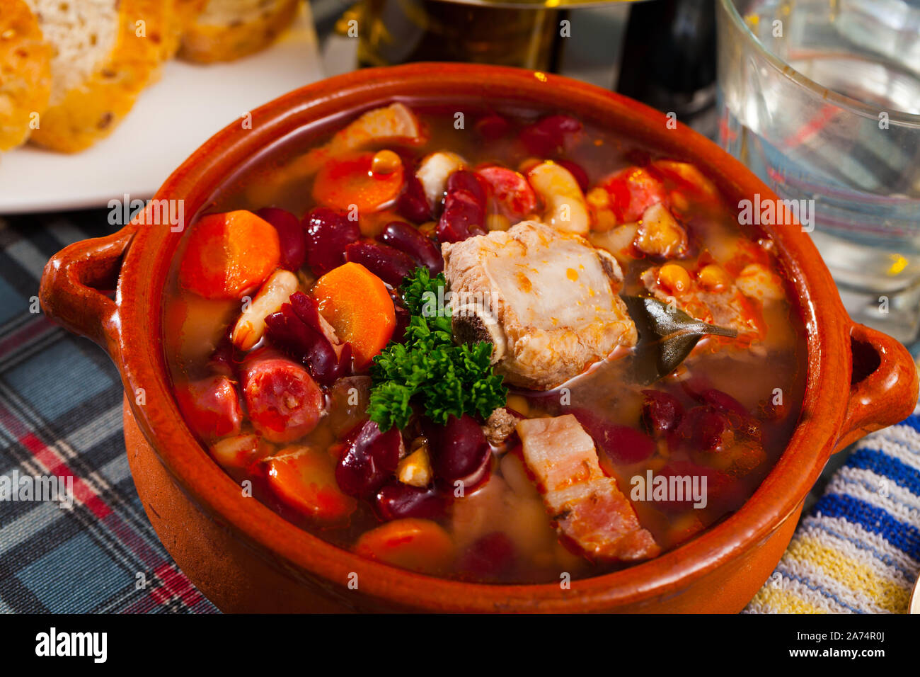 Pork vegetable soup with beans Stock Photo - Alamy