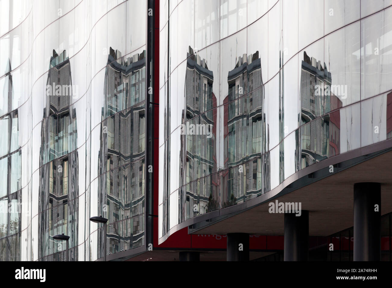 Buildings reflected in the windows of Kings Place, York Way, Kings Cross, London Stock Photo
