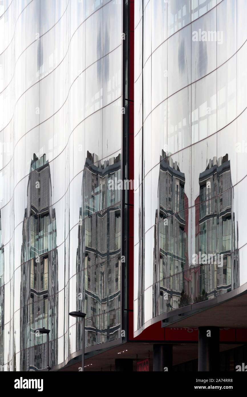 Buildings reflected in the windows of Kings Place, York Way, Kings Cross, London Stock Photo