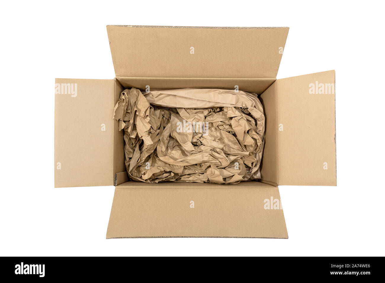 Open Cardboard box with paper filler isolated on white background. Shipping concept Stock Photo