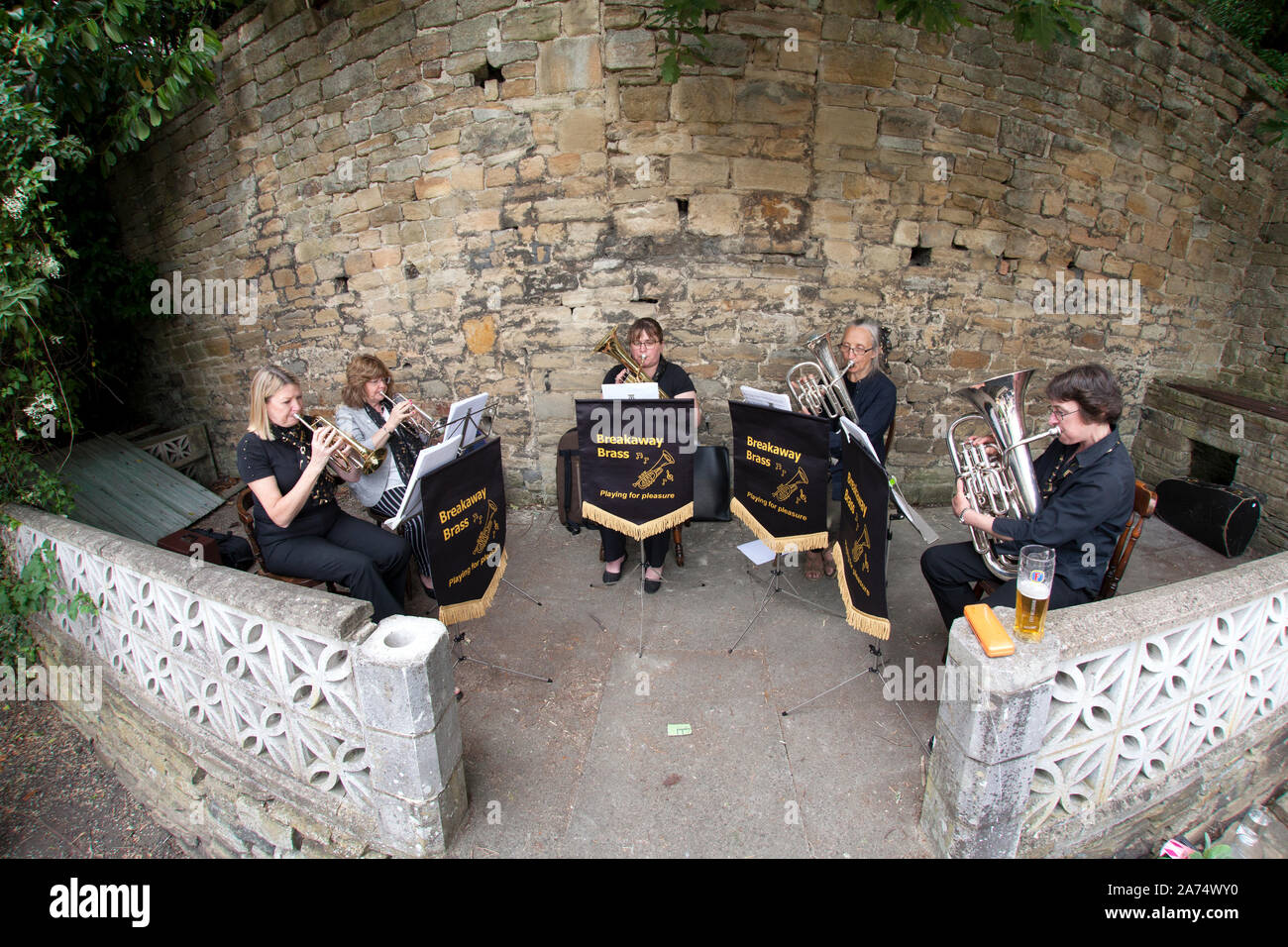 Breakaway Brass, local Calderdale brass band playing in Sowerby Bridge, West Yorkshire Stock Photo