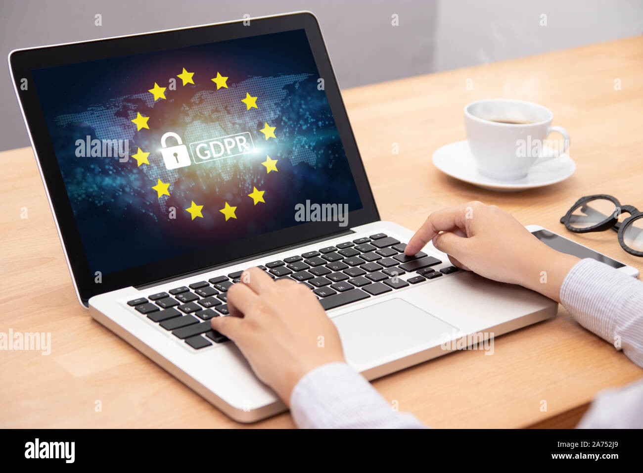 people using computer laptop with text GDPR or General Data Protection Regulation secure , star and padlock logo on monitor screen. cyber security and Stock Photo