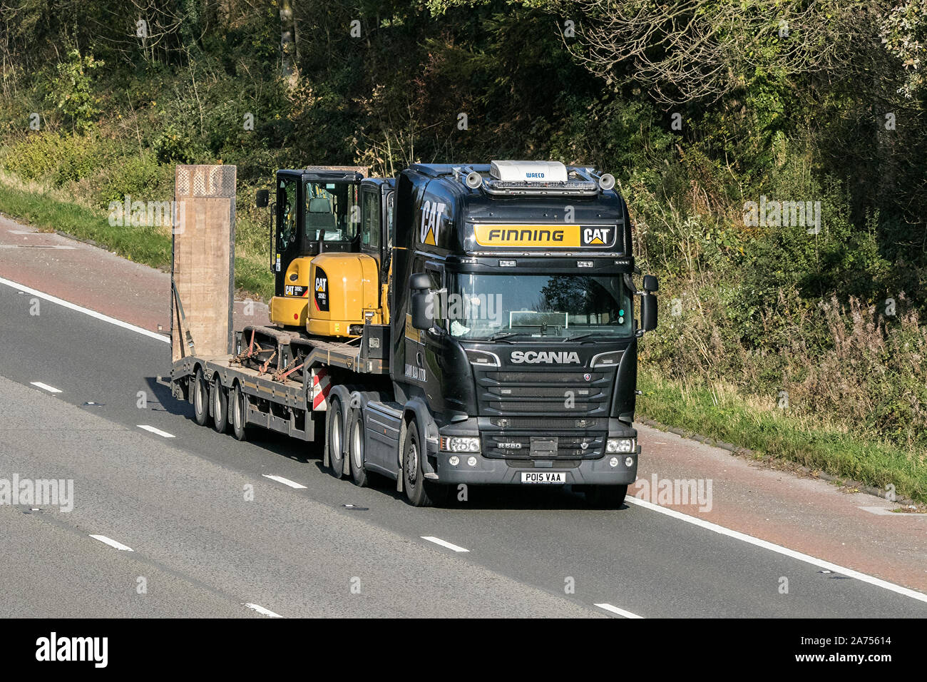 Finning CAT plant hire scania R580; Haulage delivery trucks, lorry, heavy-duty vehicles, transportation, truck, cargo carrier, HGV vehicle, UK Stock Photo