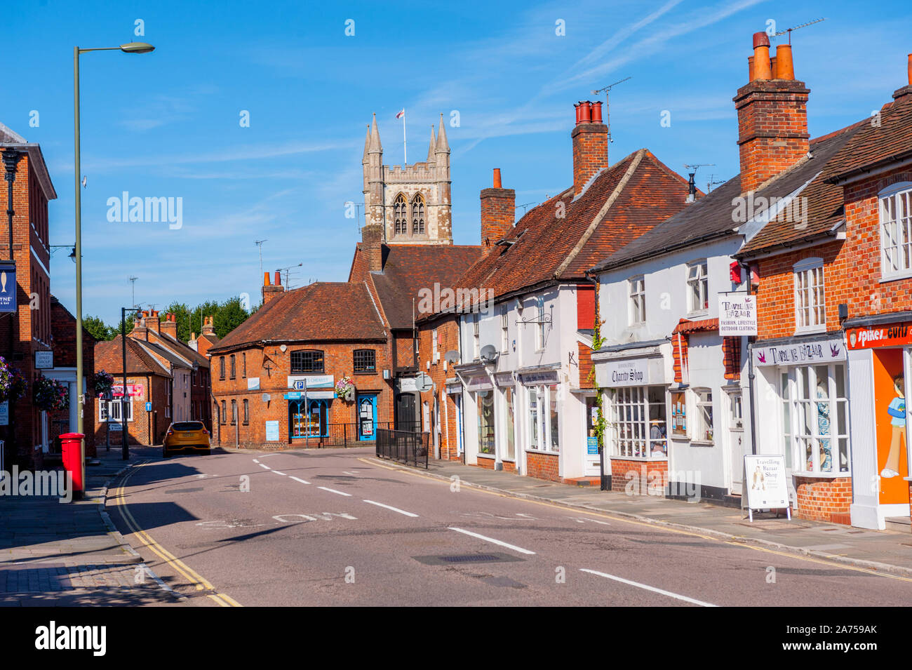 Downing Street Farnham with The tower of St Andrews church in background Stock Photo
