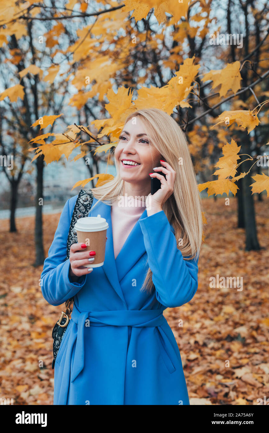 Happy mature woman calling hi-res stock photography and images - Alamy