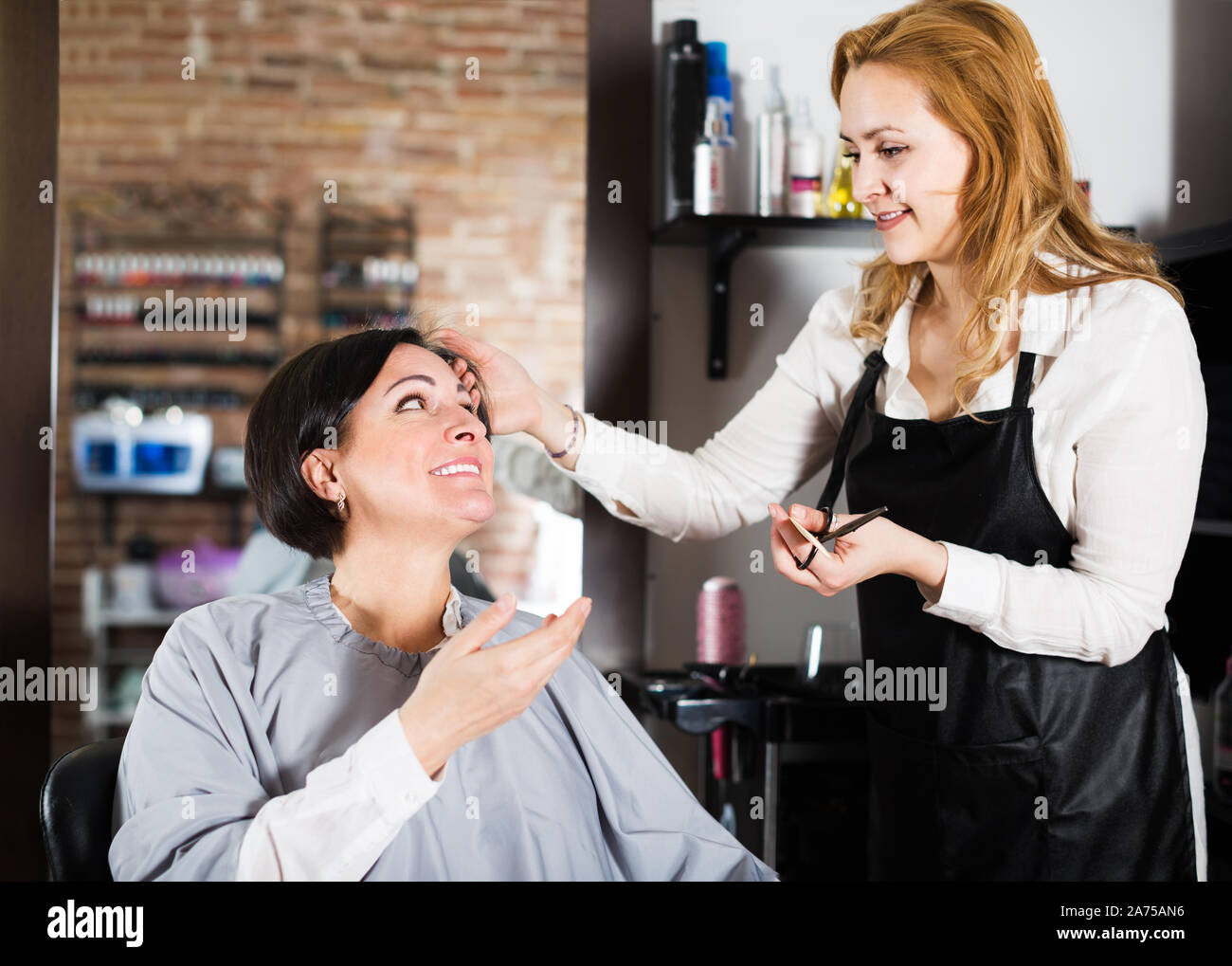 Mature woman hair brush dryer hi-res stock photography and images - Alamy