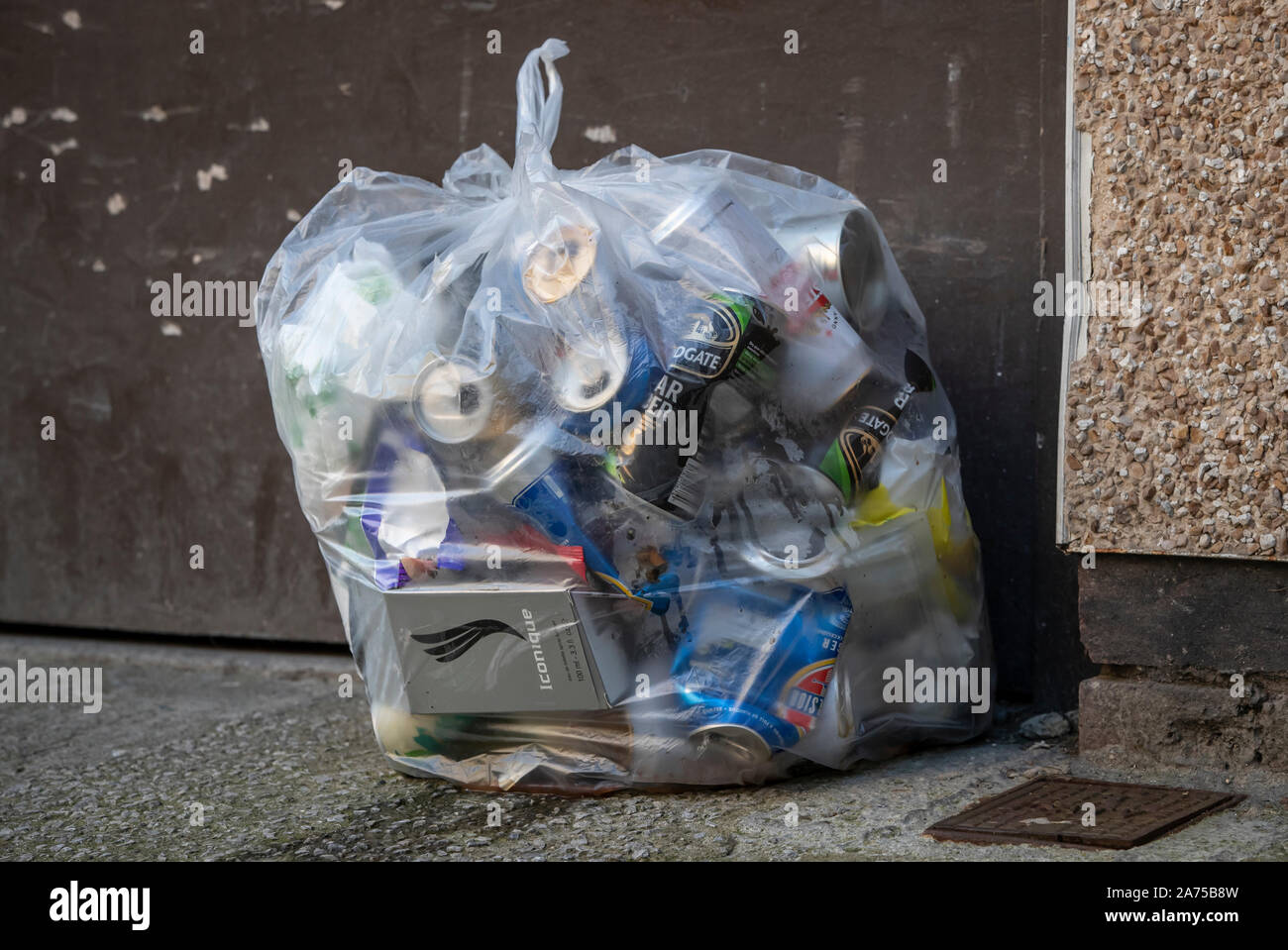 A bag of rubbish filled with cans in Halifax in Yorkshire, as a think tank says the Conservatives will have to target traditional Labour voters from regional towns in order to win the general election. Stock Photo