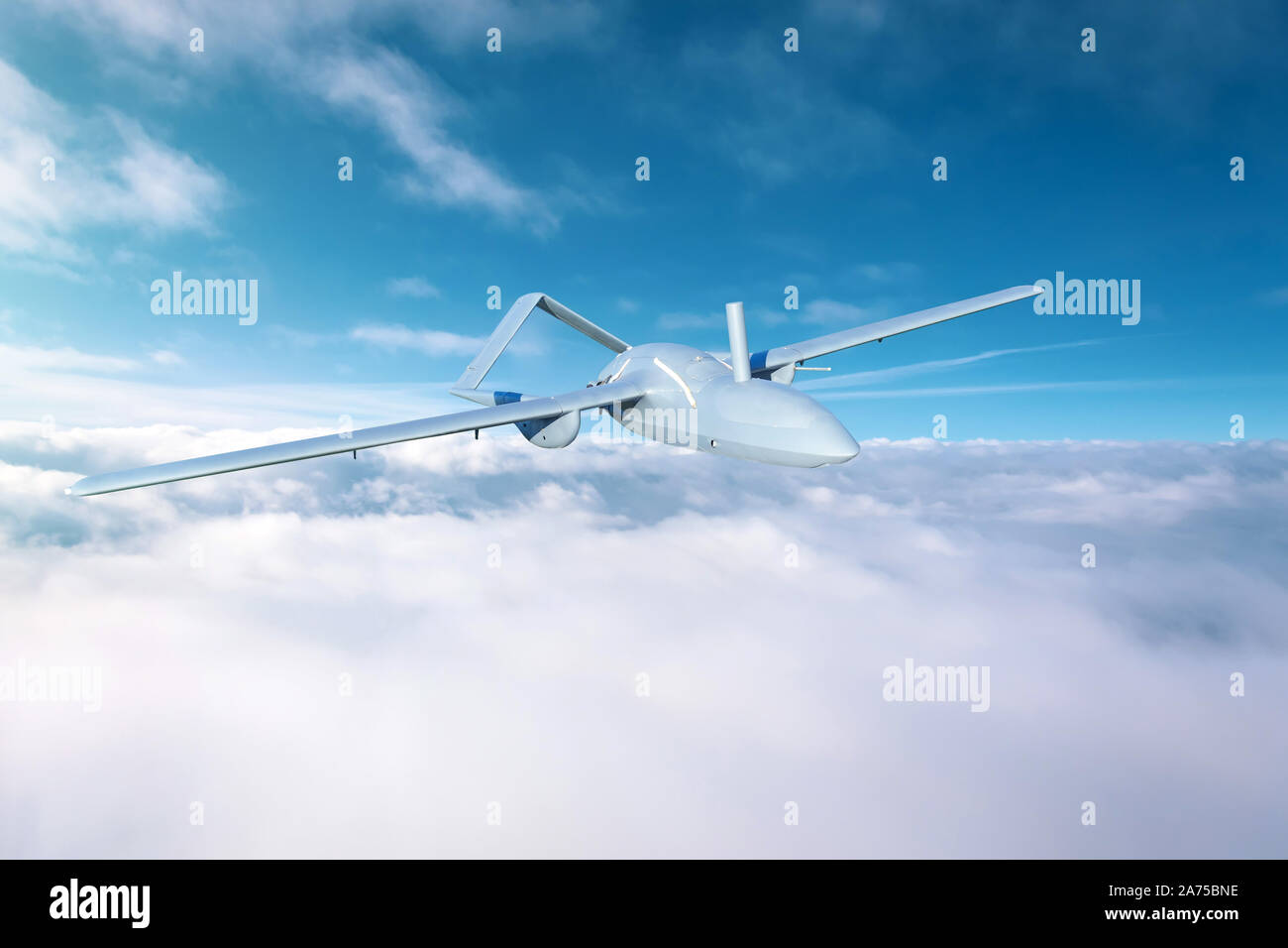 Unmanned aerial vehicles in the sky flying over dense clouds over the territory of patrol Stock Photo